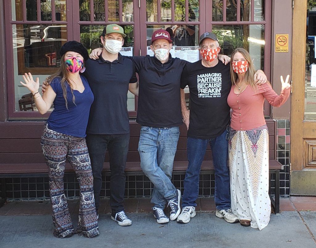 The O'Donnell family standing in front of McNear's Restaurant
